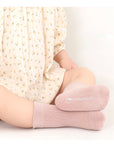 pink ribbed baby socks close-up – soft breathable cotton material