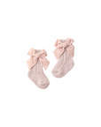 Light pink baby socks with velvet bow — cute and comfortable socks for little girls.