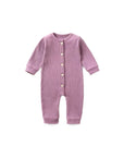 Front view of purple ribbed cotton baby jumpsuit with wooden buttons – unisex long sleeve romper.