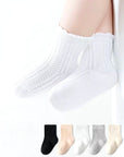 Baby wearing ribbed white cotton socks – soft breathable socks for daily wear