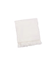 Snow white cotton baby blanket with tassel edges, soft breathable newborn blanket for nursery, cot and stroller use.