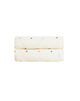 Soft spotted cotton baby blanket for newborns, breathable swaddle blanket for nursery, pram and everyday baby comfort.