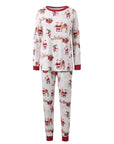 Women’s matching Christmas pajamas with Santa Claus and reindeer design, festive loungewear set.