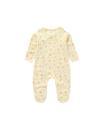 Yellow baby sleepsuit with small floral print back view in breathable cotton