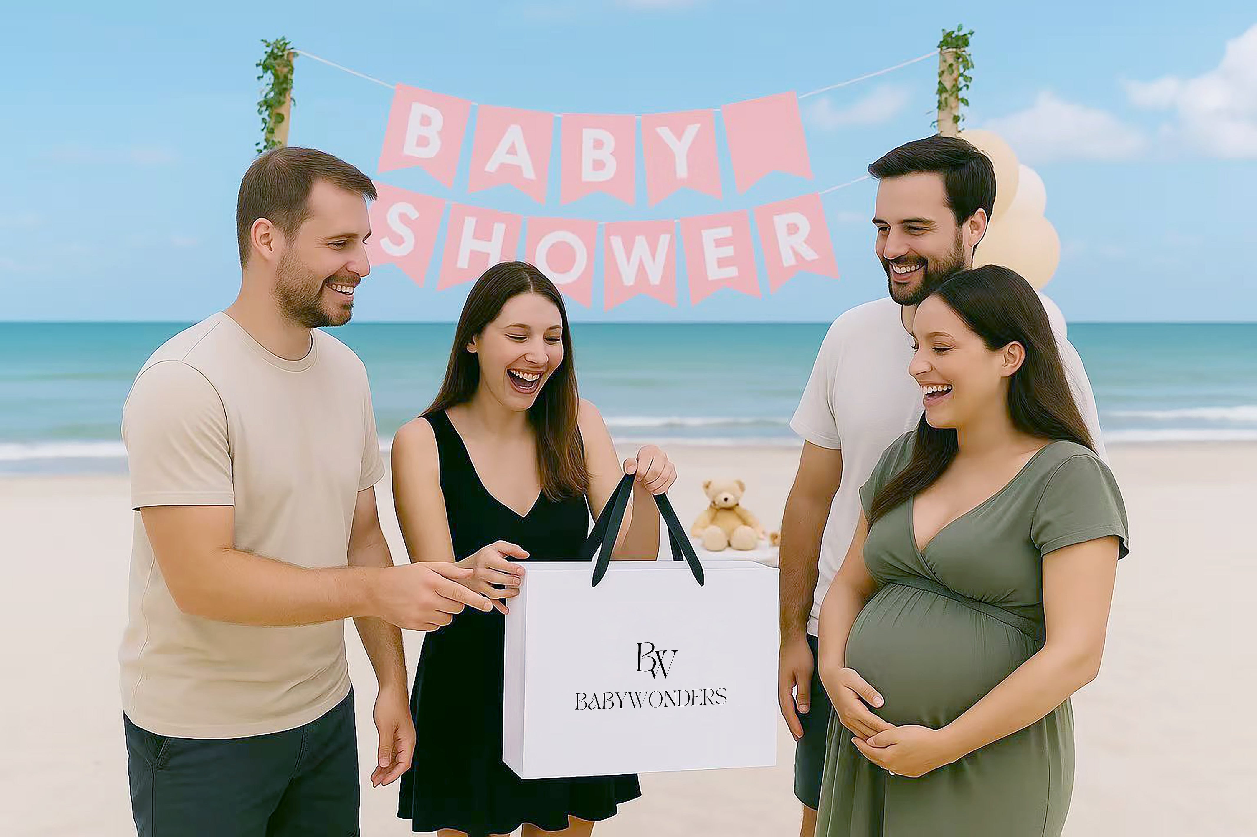 Expecting parents and friends celebrating a baby shower on the beach with a BabyWonders gift bag