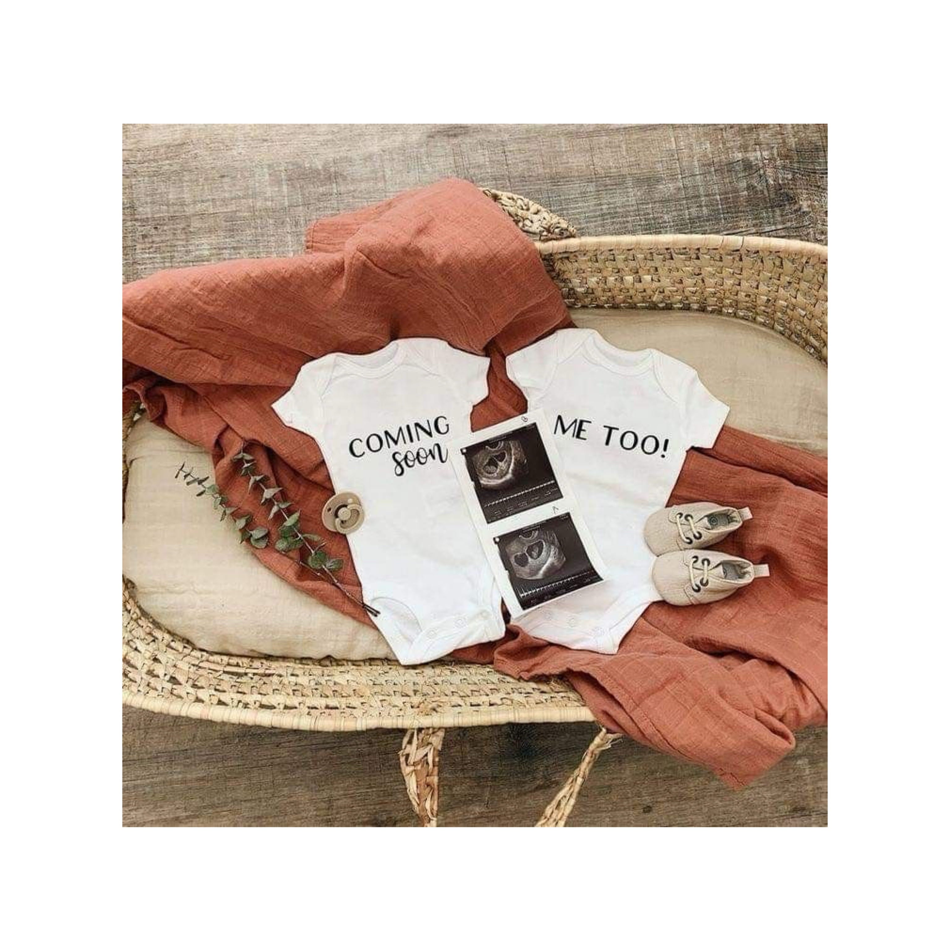 Organic newborn gift set with baby clothes and Coming Soon card, eco-friendly baby shower gift idea.