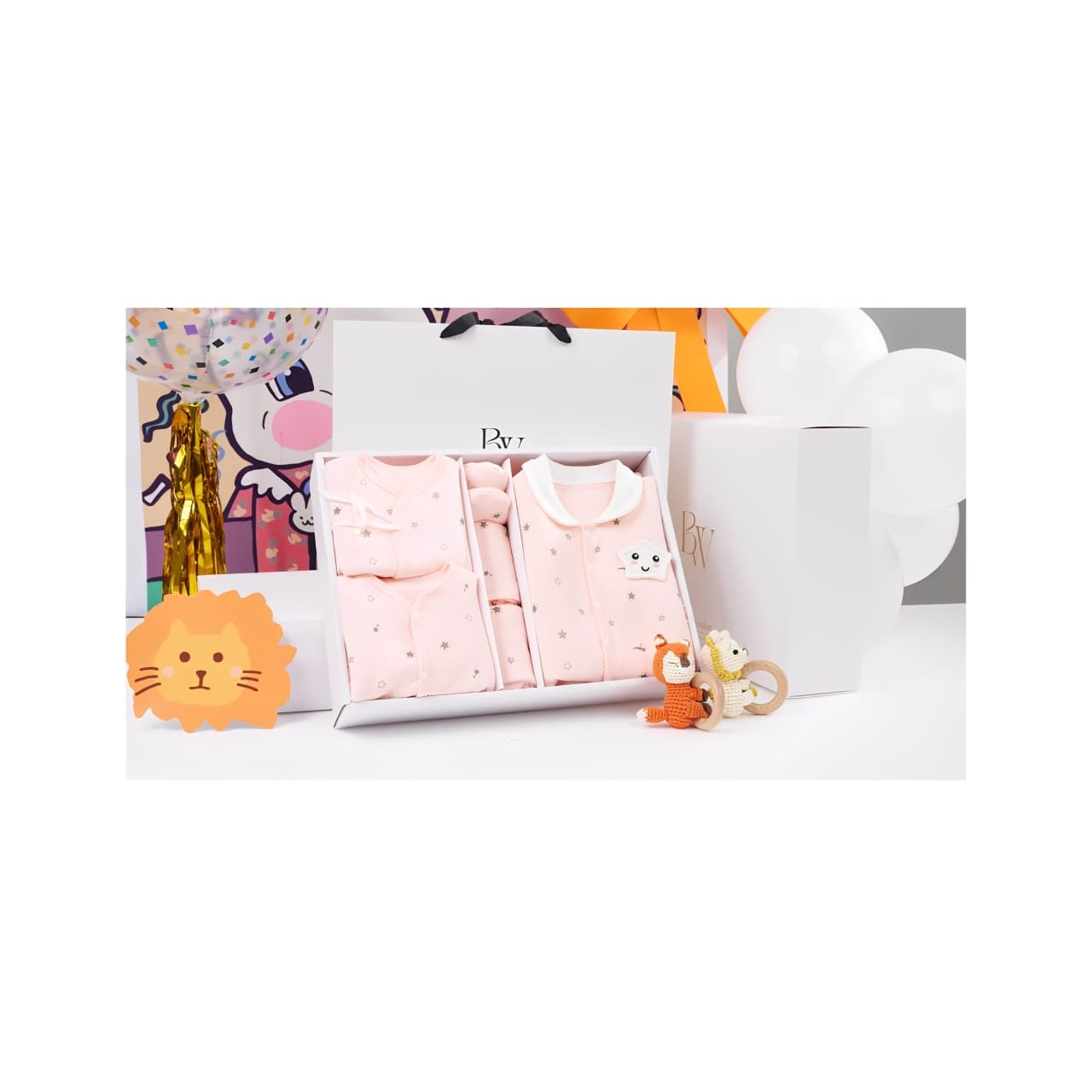 Adorable baby gift set with soft neutral-tone clothing, decorative gift box — beautifully presented for a special occasion by BabyWondersUK.