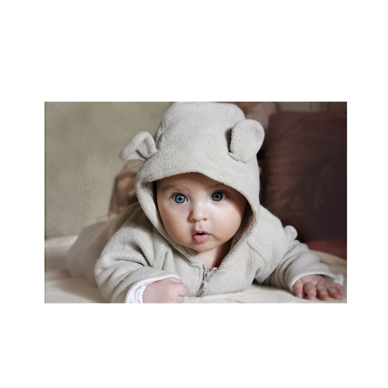 Baby wearing organic cotton onesie, eco-friendly newborn gift for parents