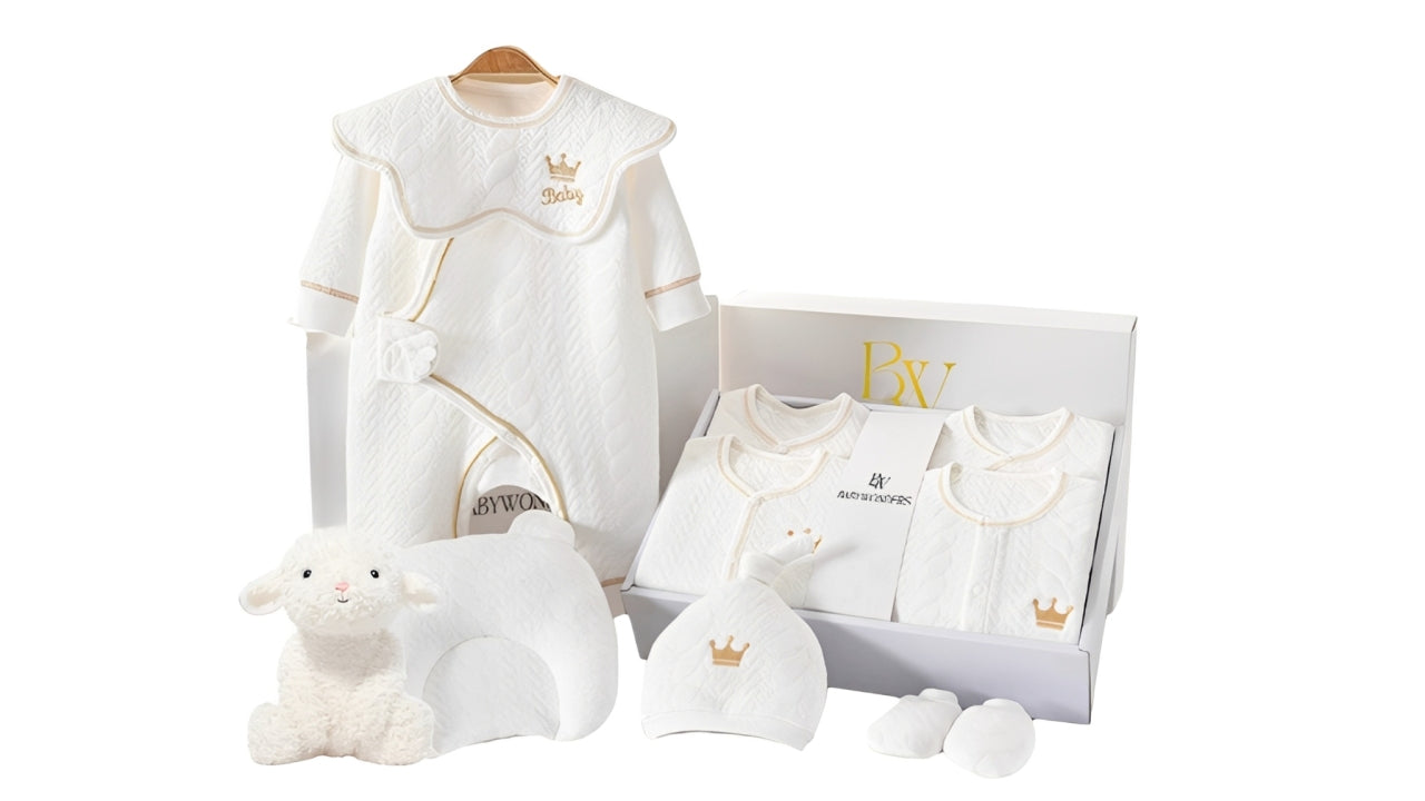 Newborn baby gift set with white clothing, hat and soft toy in a gift box by Babywonder