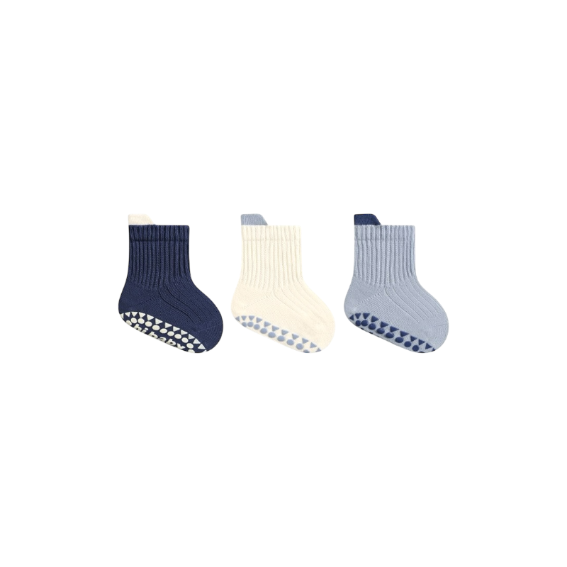 Three pairs of socks in navy, beige, and gray on a white background