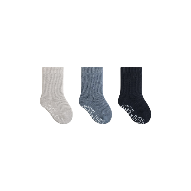 Three pairs of socks in gray, blue, and black on a white background