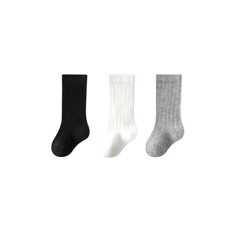 Three socks in black, white, and gray on a white background