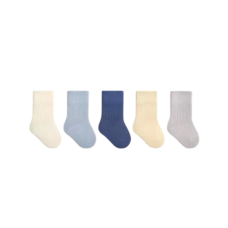 Set of five pairs of blue socks in different colors on a white background