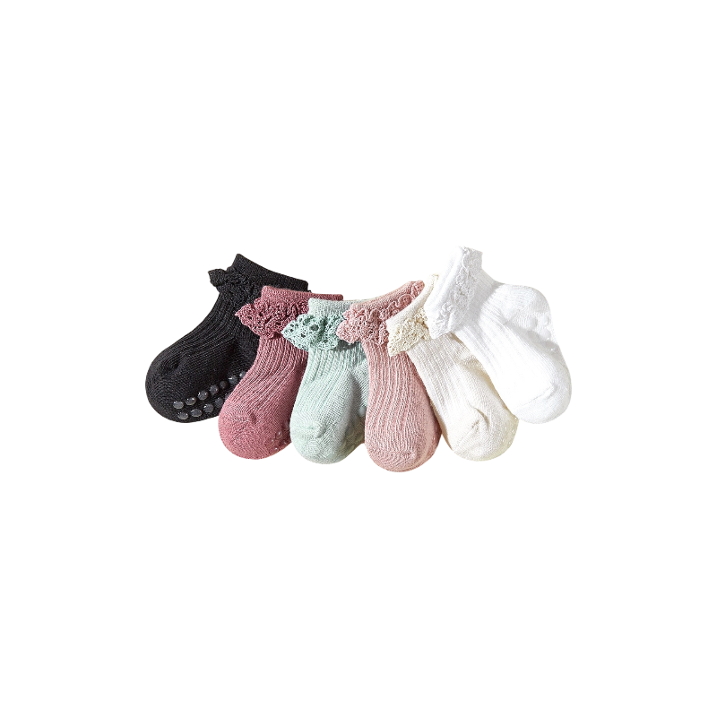 Set of baby socks in various colors on a white background
