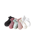 Set of baby socks in various colors on a white background