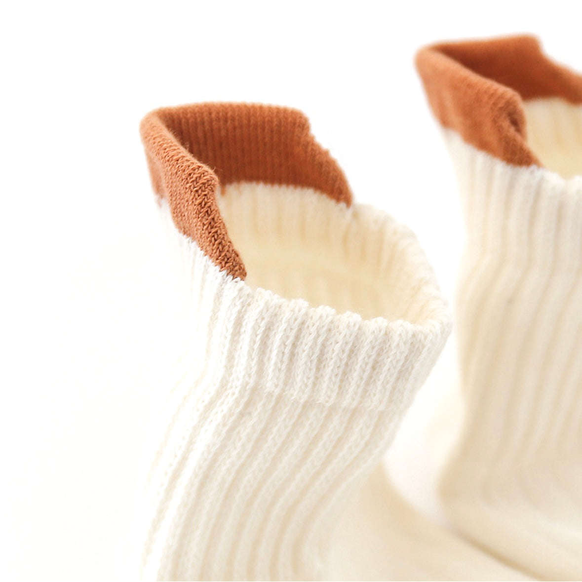 Flat lay of 3-pack anti-slip ribbed baby socks – cotton breathable non-slip design