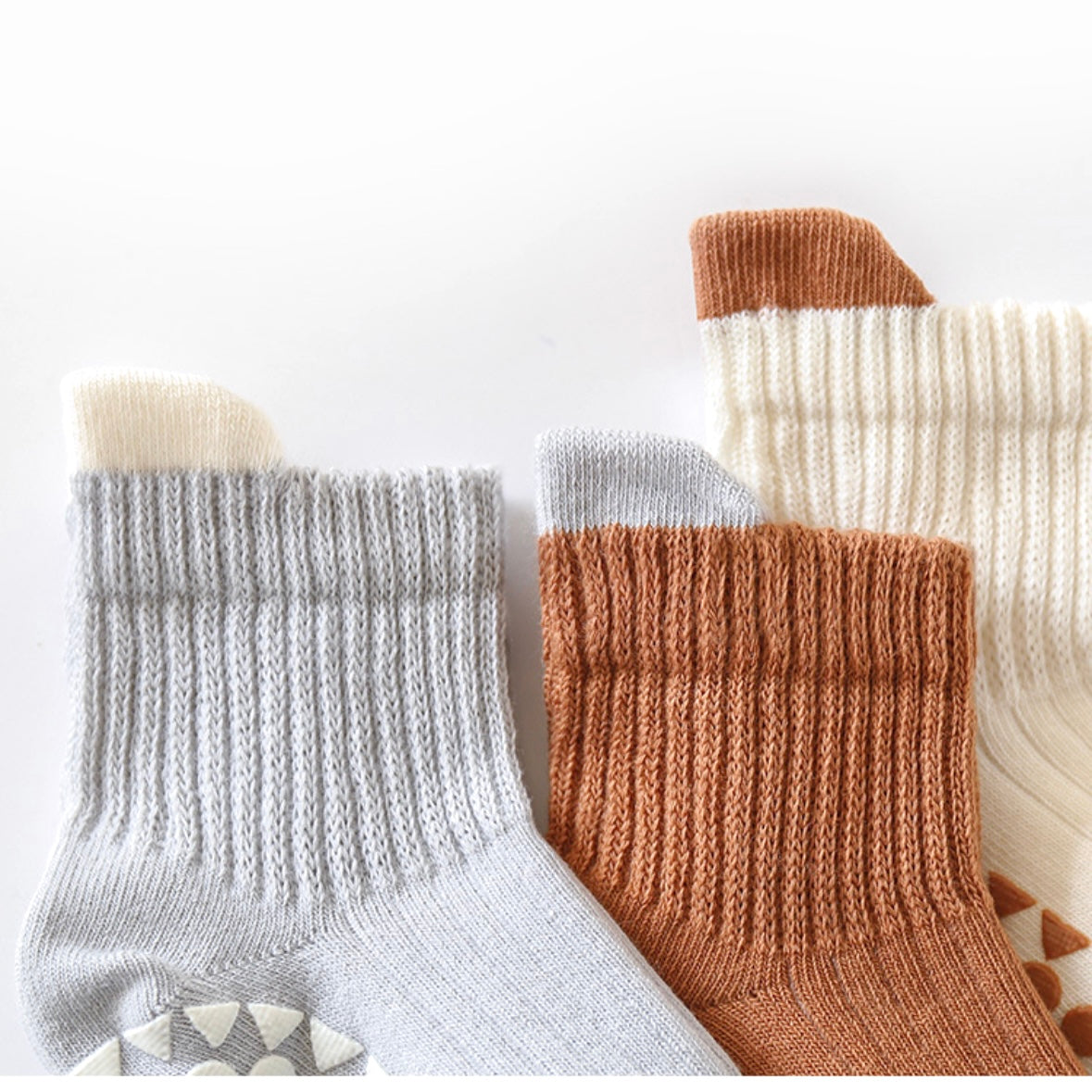 Close-up of anti-slip sole dots on ribbed cotton baby socks