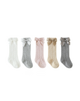 Set of baby lace knee-high socks in white, gray, pink, beige, and charcoal, each with a cute bow
