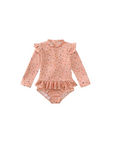 Baby long sleeve confetti dot swimsuit peach front view with frill detail, colourful polka dot baby swimwear for beach and pool
