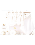 Luxury newborn baby gift set in white with clothing, blanket, bib, and essentials - perfect baby shower present