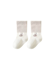 Beige ribbed cotton baby socks with embroidered bear paw and non-slip sole