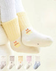 Baby wearing yellow and white bear paw embroidered thick cotton socks – BabyWonders UK