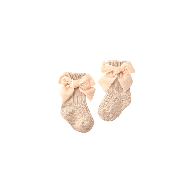 Beige cotton baby socks with velvet bow — neutral tone for minimalist baby outfits.
