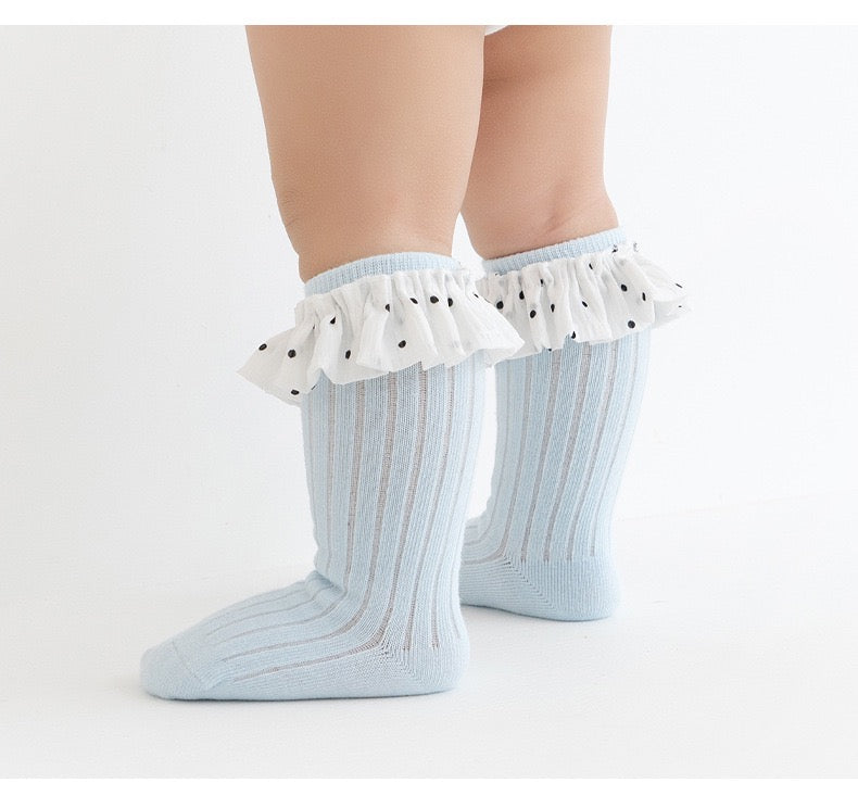 toddler wearing blue ruffle socks – soft cotton frill socks for babies and toddlers