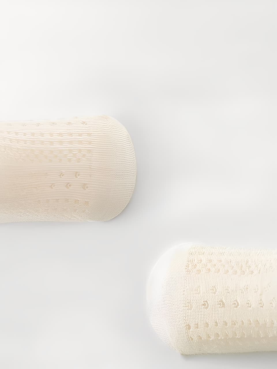 Close-up of baby socks showing soft cotton texture and breathable mesh knit for cooling comfort