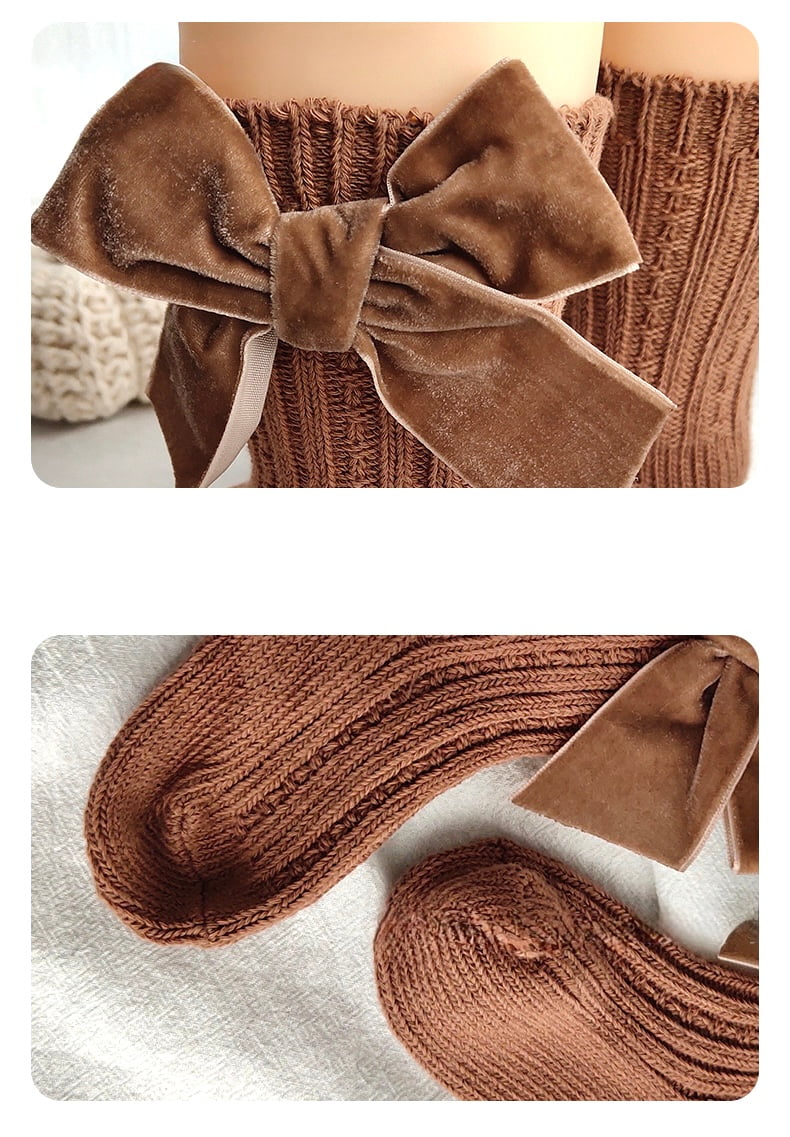 Close-up of brown velvet bow baby socks — premium ribbed cotton and soft bow texture.