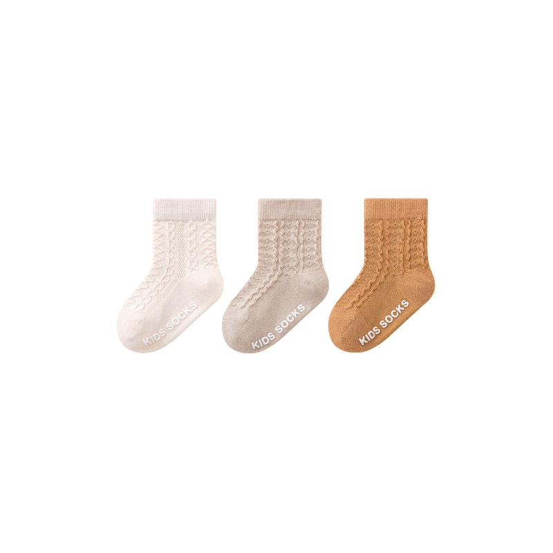 Baby wearing orange cable knit anti-slip socks – cosy cotton baby socks