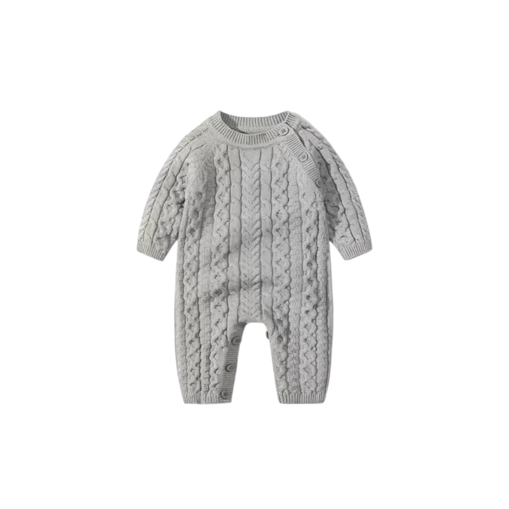 Baby cable knit romper front view with classic knit texture and long sleeves