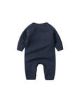 Baby cable knit romper back view with long sleeves and ribbed trim

