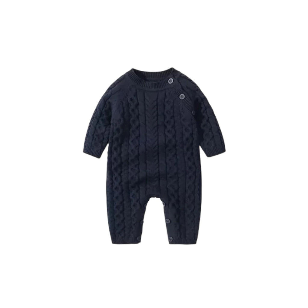 Baby cable knit romper front view with button shoulder fastening and long sleeves