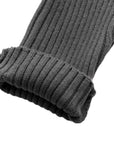 Close-up of ribbed sleeve cuff on charcoal knit baby romper, thick soft fabric for winter warmth