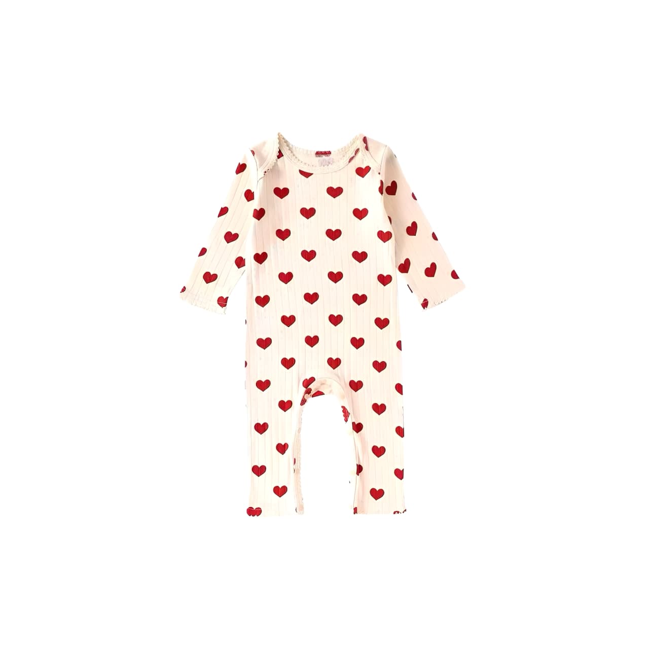 Cream cotton baby romper with red heart pattern, long sleeves, soft ribbed texture, perfect for spring or fall wear.
