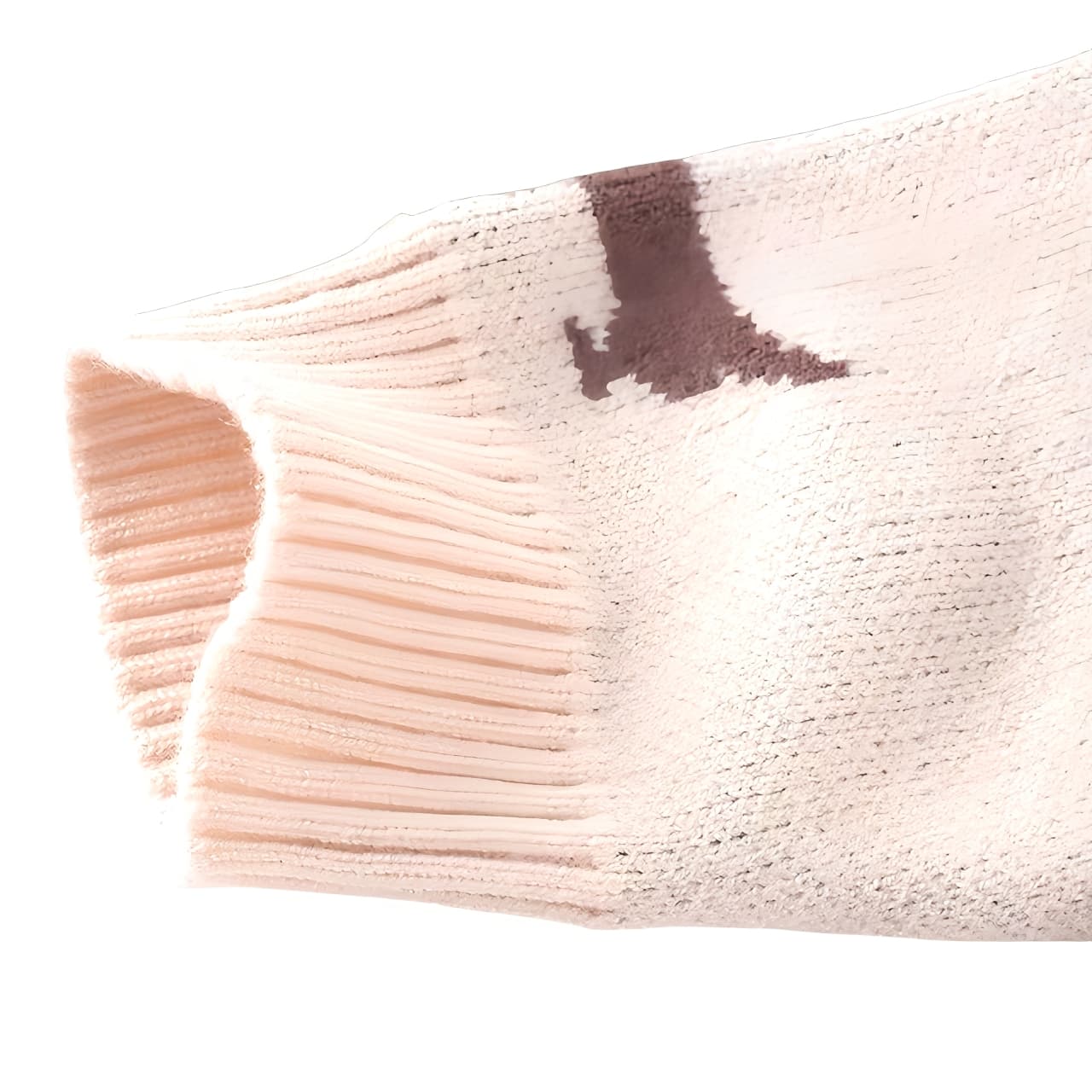 Close-up of cream knitted baby romper sleeve showing soft ribbed cuff and brown dog pattern texture