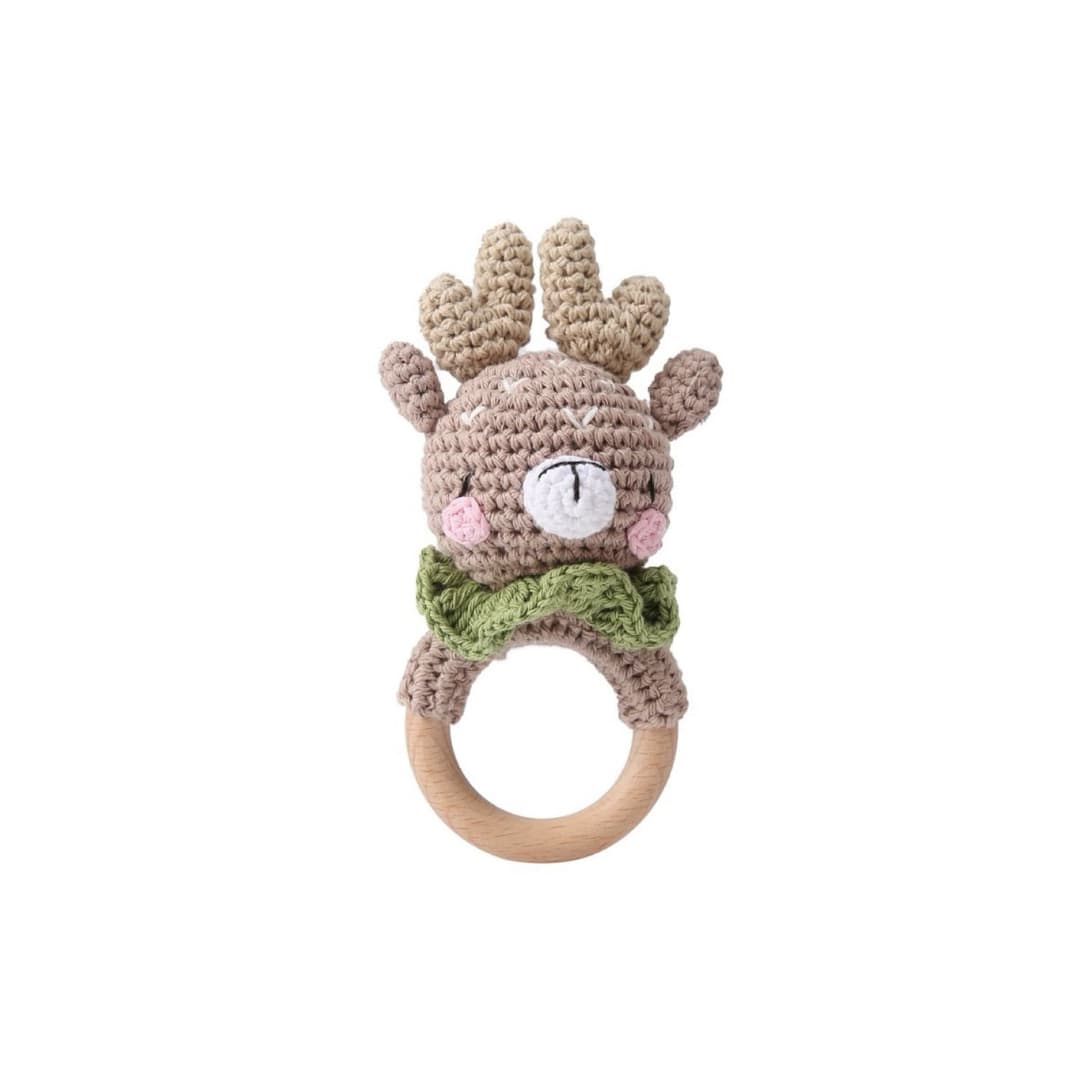 Crochet deer teether with a wooden teething ring on a neutral background, a thoughtful newborn gift and baby shower gift in the UK.