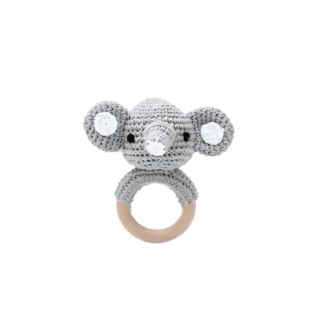 Handcrafted crochet elephant rattle with natural wooden ring, designed for newborn babies, sensory play, teething comfort and baby shower gifts.