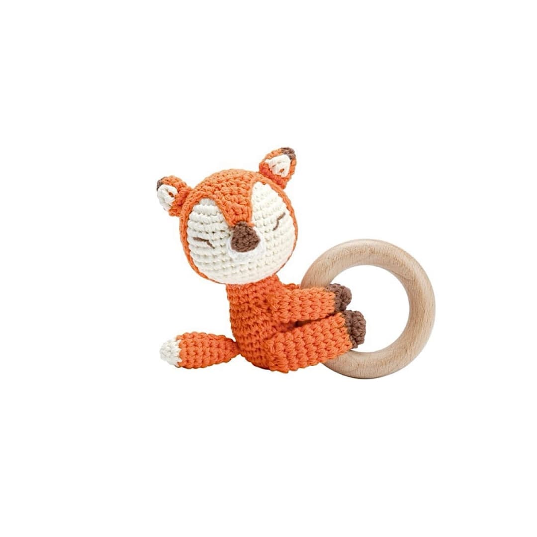 Handcrafted crochet fox rattle with natural wooden ring, a soft sensory toy for newborn babies and a thoughtful baby shower gift.