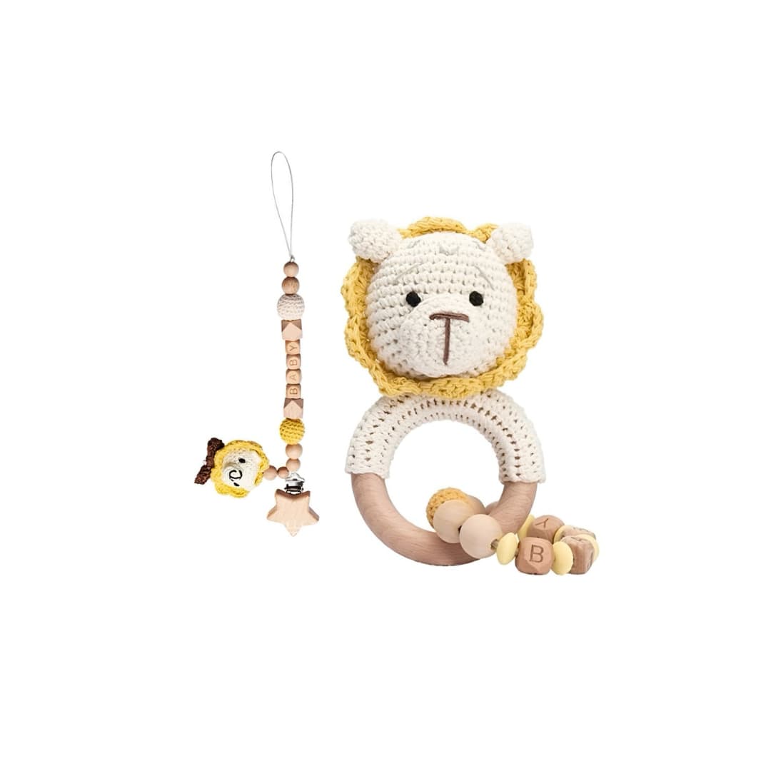 Handcrafted crochet lion rattle and dummy clip set with natural wooden beads, a soothing newborn baby toy and thoughtful baby shower gift.