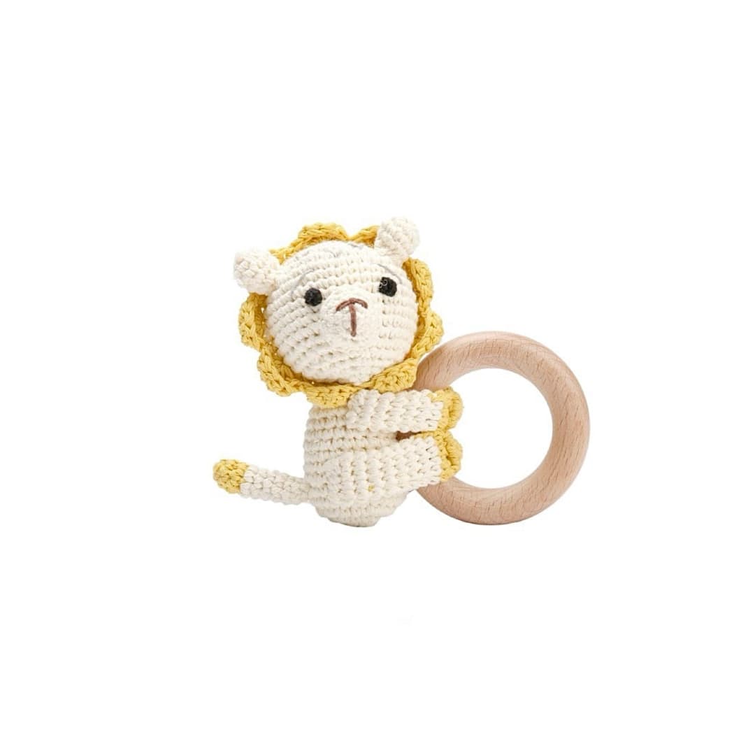 Handcrafted crochet lion rattle with natural wooden ring, a soft sensory toy for newborn babies and a thoughtful baby shower gift.