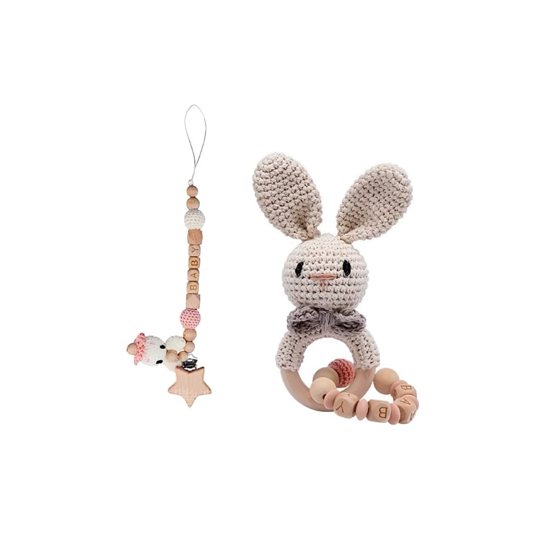 Handcrafted crochet pink bunny rattle and dummy clip set with natural wooden beads, a beautiful newborn baby gift and baby shower gift for little girls.