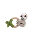 Handcrafted crochet sloth rattle with natural wooden ring, a soft sensory toy for newborn babies and a thoughtful baby shower gift.