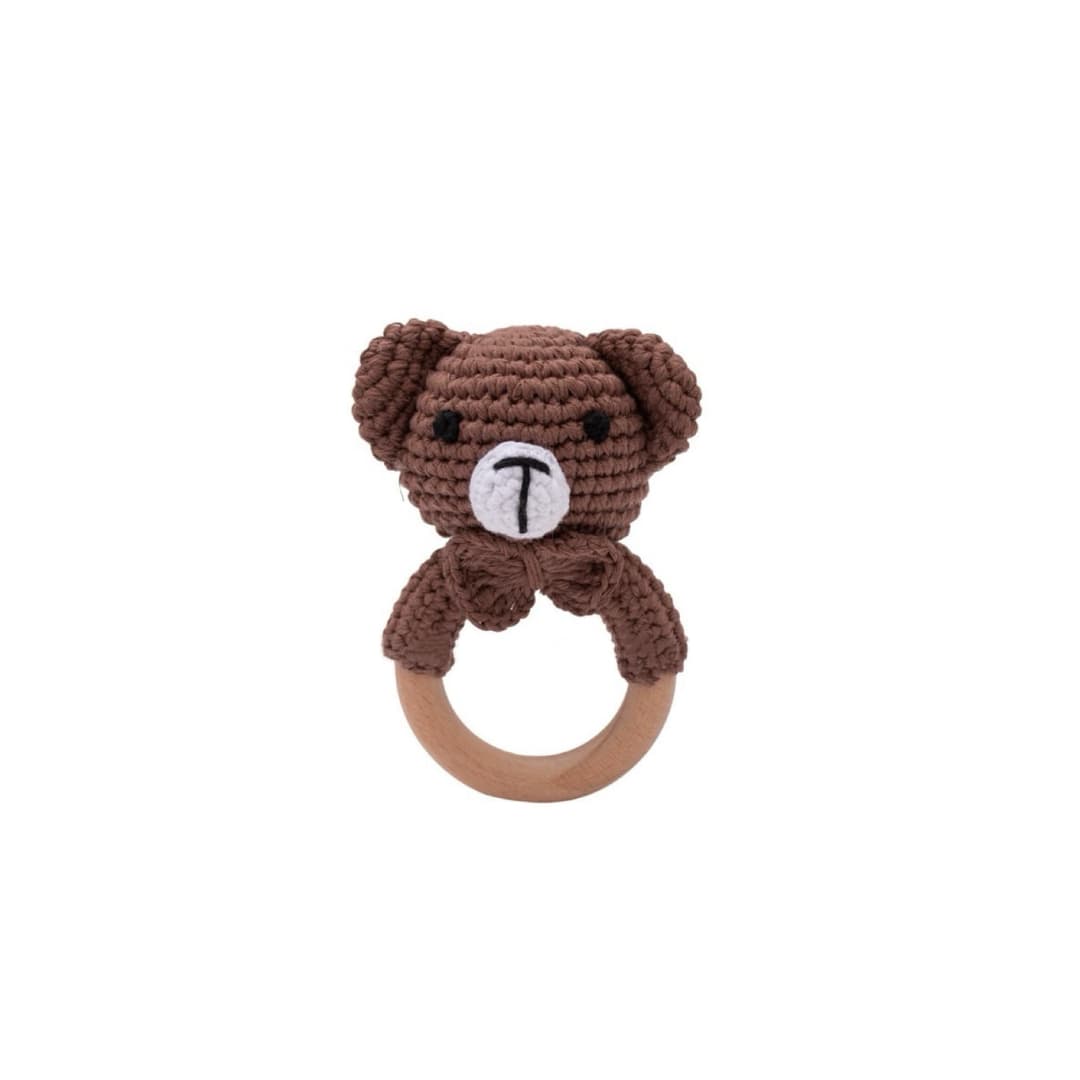Handcrafted crochet teddy bear rattle with natural wooden teething ring for babies, sensory toy and newborn baby gift.