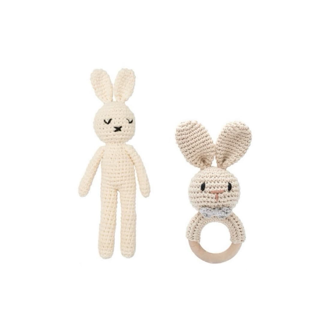 Handcrafted crochet twin off white bunny rattle set with soft bunny comfort toy and wooden ring rattle, perfect for newborn babies, baby shower gifts and nursery essentials.