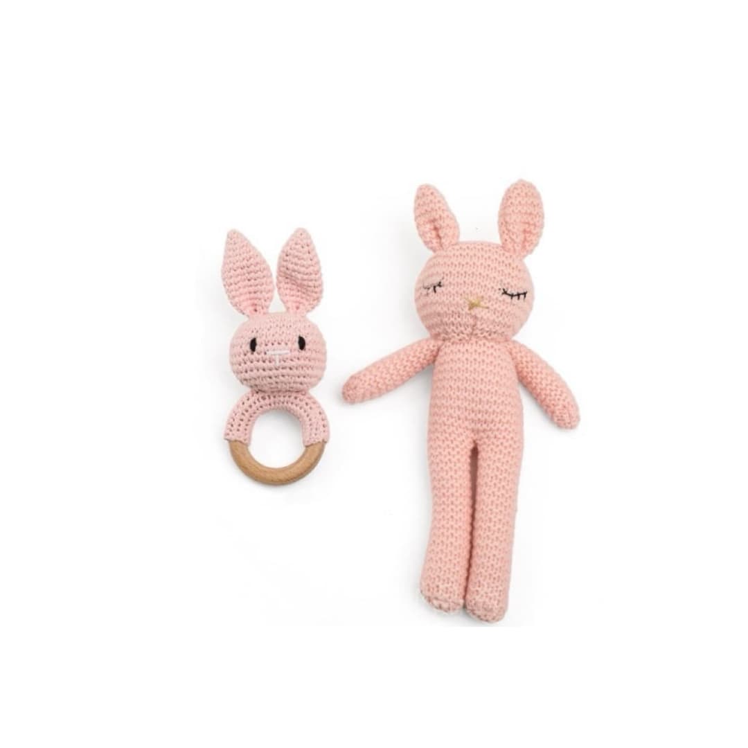 Handcrafted crochet twin pink bunny rattle set featuring a soft bunny comfort toy and matching bunny wooden ring rattle, ideal for newborn babies, baby shower gifts and nursery essentials.