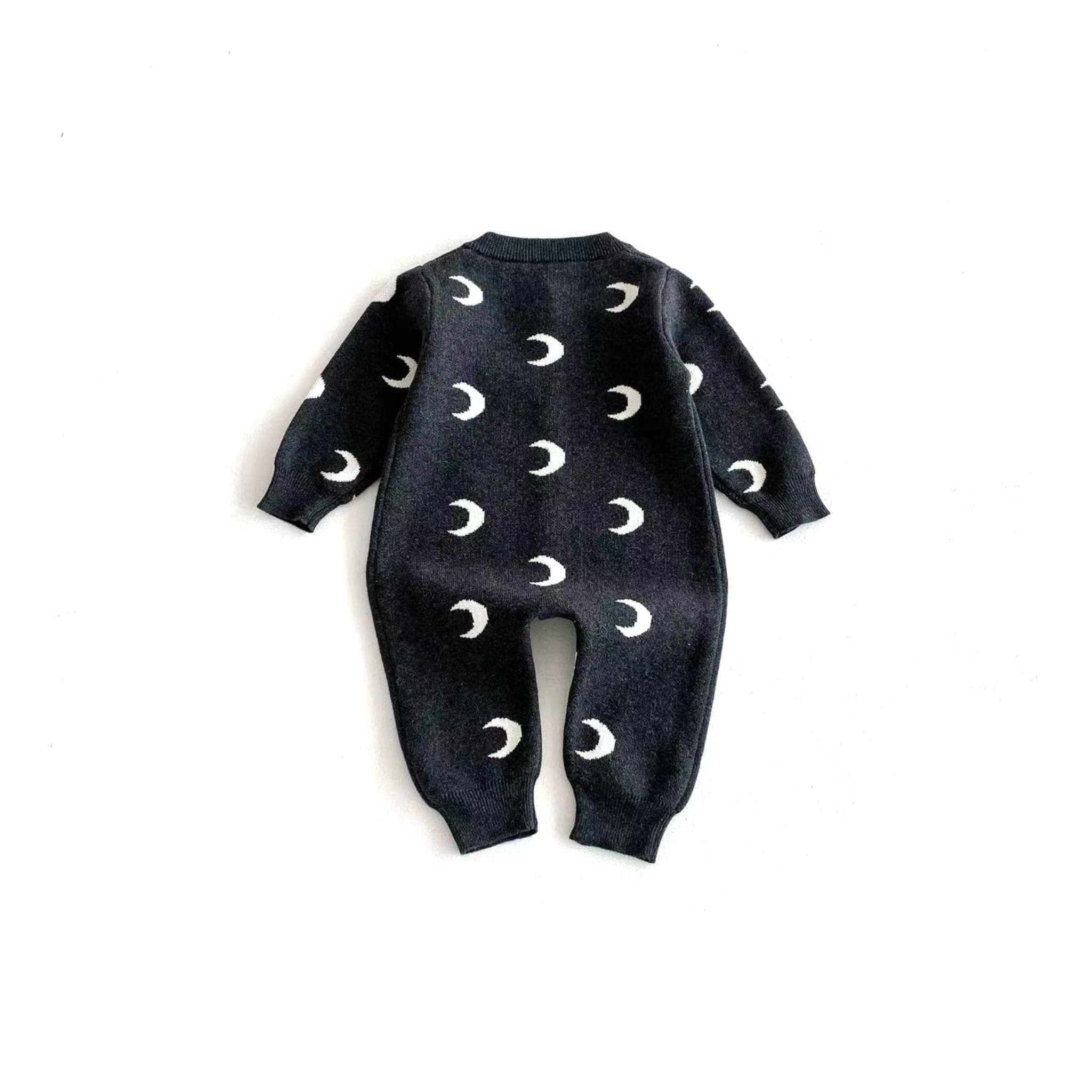 Back view of dark gray moon print baby jumpsuit made of soft cotton knit for toddlers.