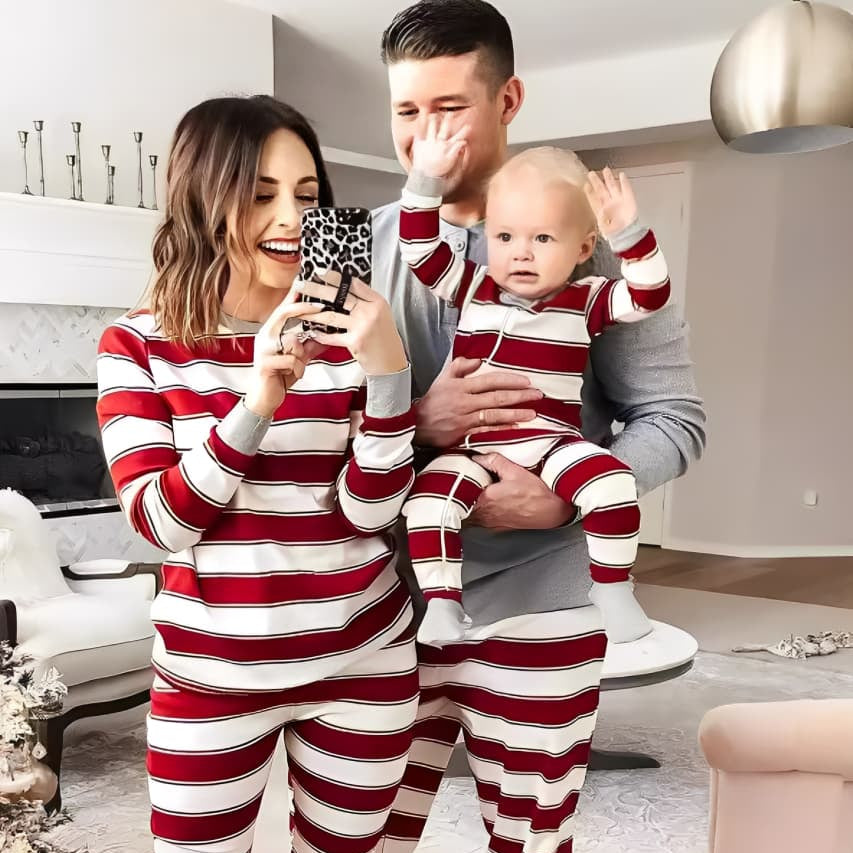 Family matching red and white striped Christmas pajamas set for parents and kids