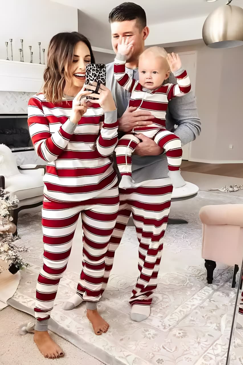 Family matching red and white striped Christmas pajamas set for parents and kids